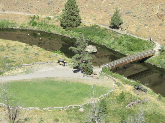 Looking Down at the Walking Bridge Over Crooked River channel that Swirls around the Base of Smith Rock  